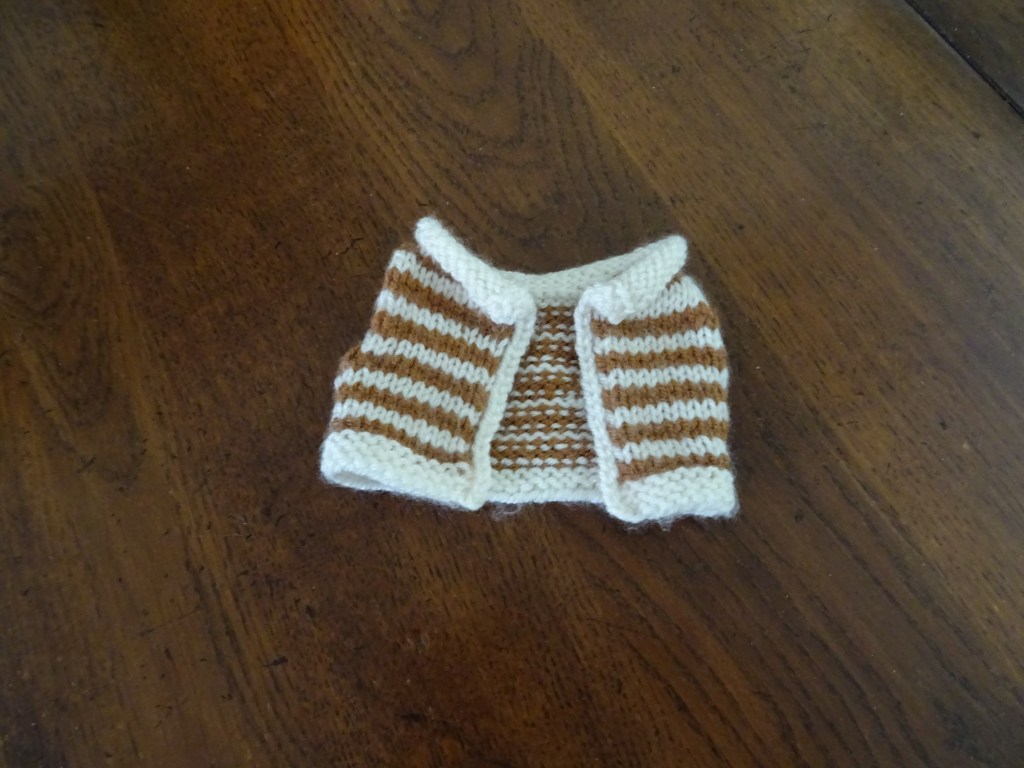 Gebreide bodywarmer.  Knitted Bodywarmer