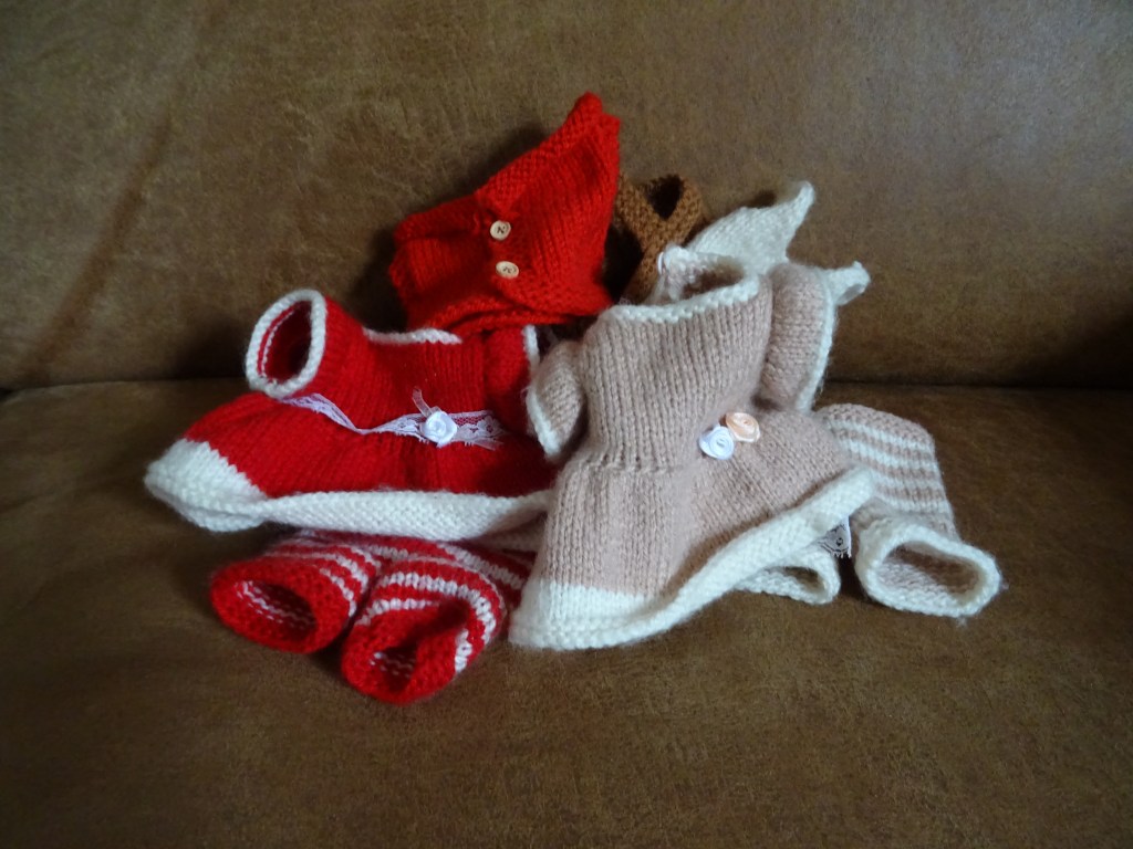 Gebreide kleren van de berenfamile