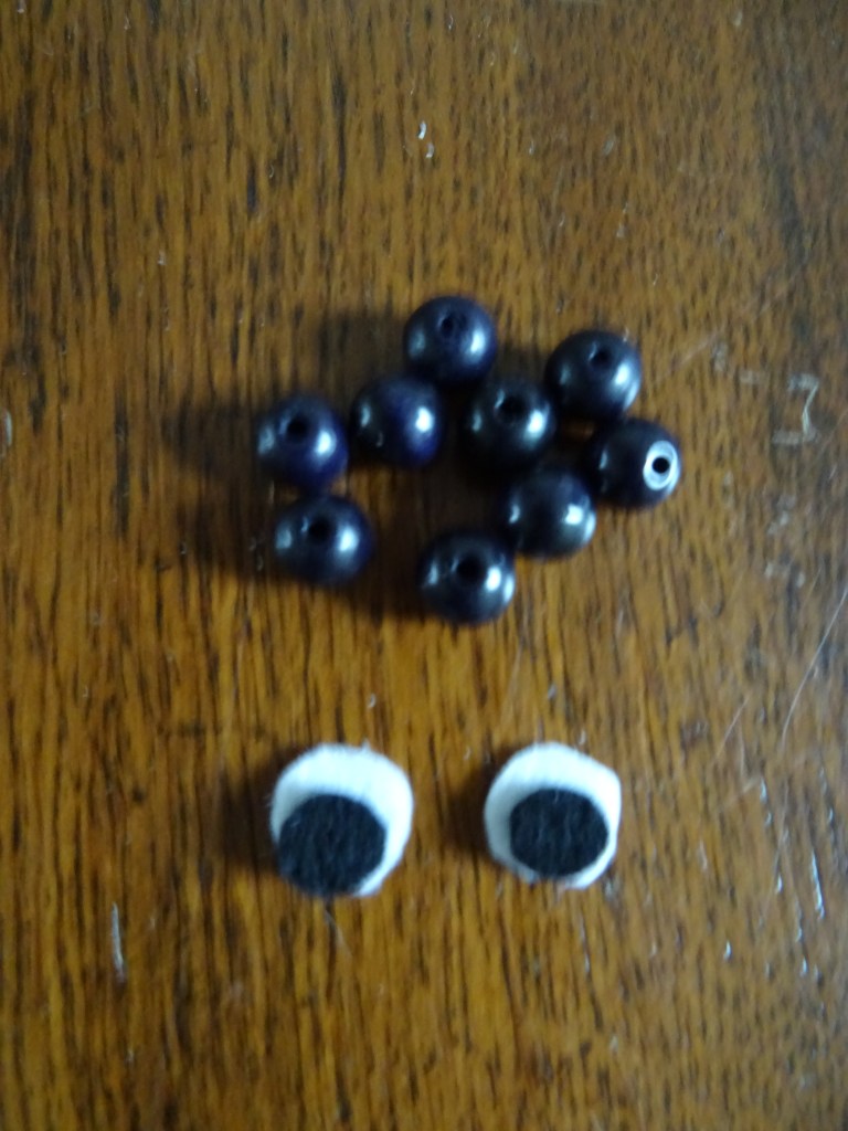 kralen en ogen van vilt
